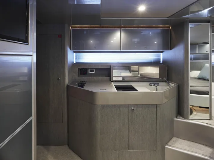  Yacht Photos Pics Luxurious interior of 2014 Riva Rivarama Super 44 yacht, featuring modern kitchen design.