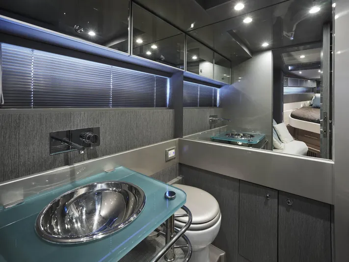  Yacht Photos Pics Luxurious bathroom interior of 2014 Riva Rivarama Super 44 yacht with modern fixtures.