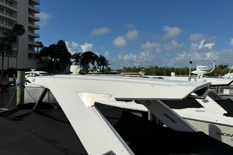  Yacht Photos Pics 2022 Monterey 385 Super Express yacht docked under clear blue sky.