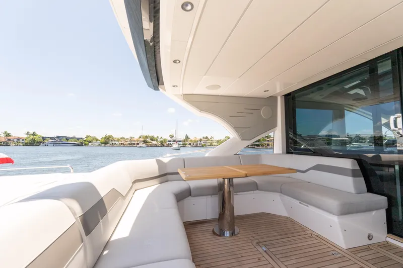 Brew Crew Yacht Photos Pics Luxurious Sunseeker Predator 60 yacht deck with seating area, 2022 model.