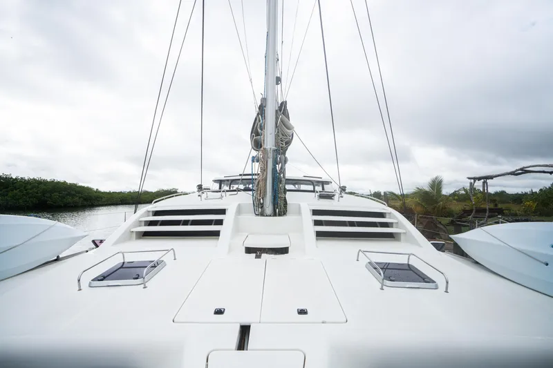 Dreaming On Yacht Photos Pics Front view of a 2003 Leopard 47 catamaran with overcast sky.