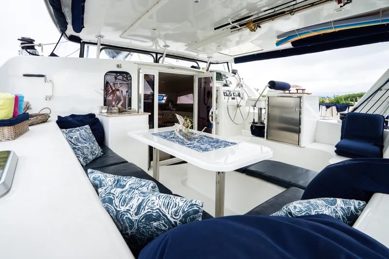 Dreaming On Yacht Photos Pics Luxurious interior of a 2003 Leopard 47 yacht with elegant seating and modern amenities.