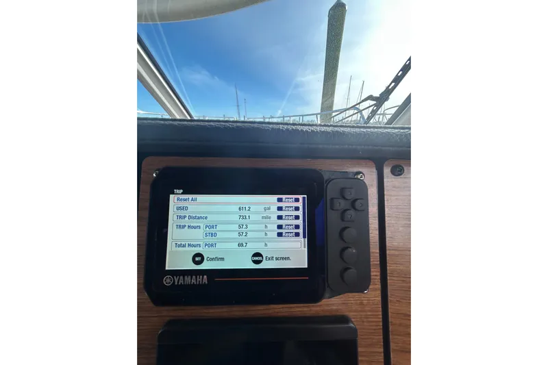  Yacht Photos Pics Yamaha display on 2024 Cutwater C-288 Coupe showing trip data and fuel usage.