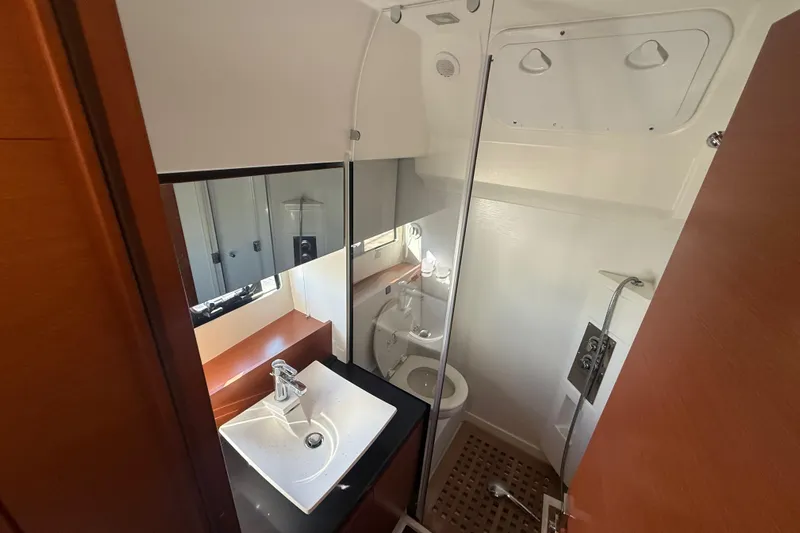  Yacht Photos Pics Luxurious bathroom in 2016 Prestige 450S yacht with modern sink and shower.