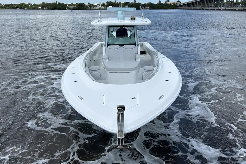  Yacht Photos Pics 2023 HCB 39 Speciale boat cruising on open water, showcasing sleek design and spacious deck.