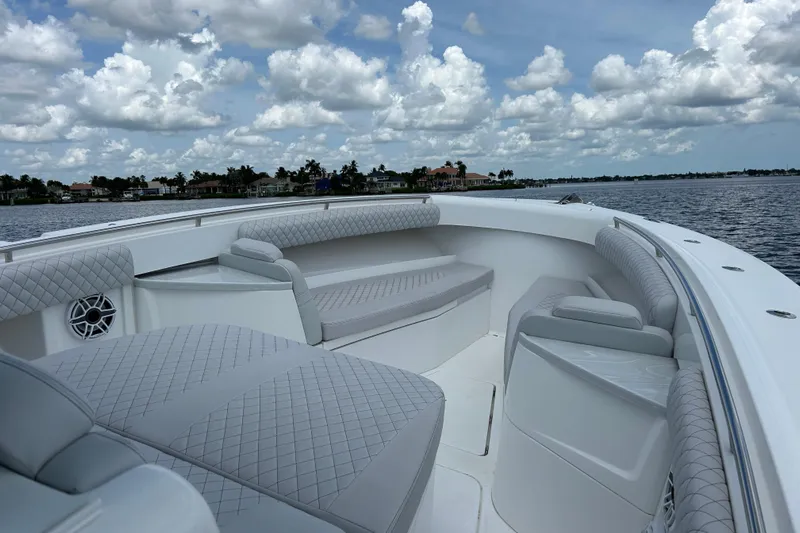  Yacht Photos Pics 2023 HCB 39 Speciale boat interior with luxurious seating and scenic water view.