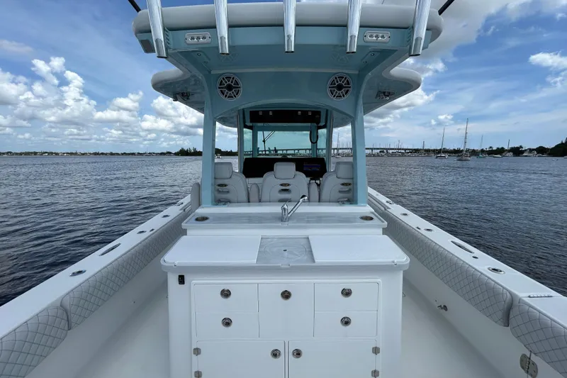  Yacht Photos Pics 2023 HCB 39 Speciale boat interior with helm, seating, and ocean view.