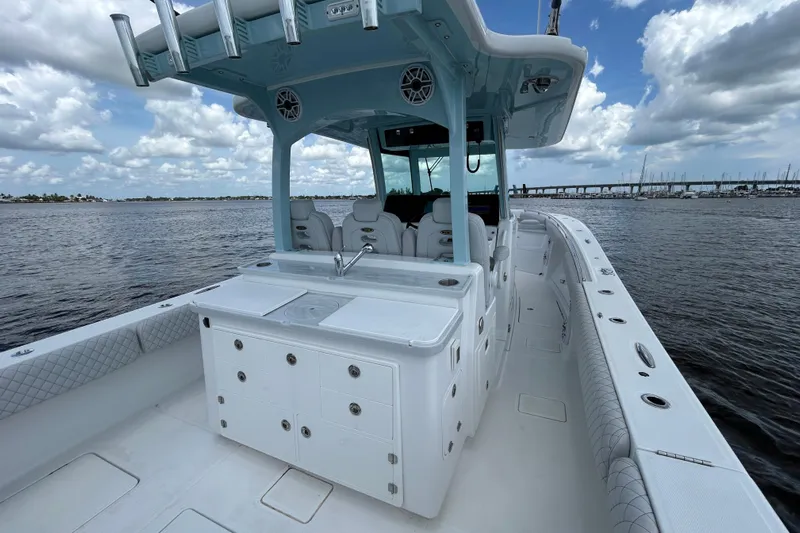  Yacht Photos Pics 2023 HCB 39 Speciale boat on water, featuring spacious deck and modern amenities.