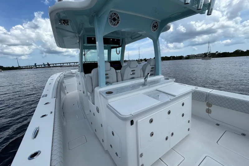  Yacht Photos Pics 2023 HCB 39 Speciale boat with sleek design and spacious deck on the water.