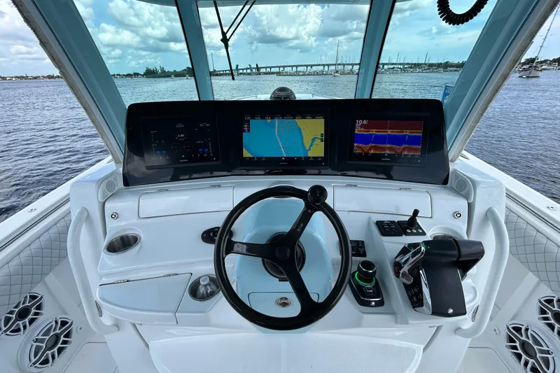  Yacht Photos Pics Helm of 2023 HCB 39 Speciale boat with advanced navigation displays.