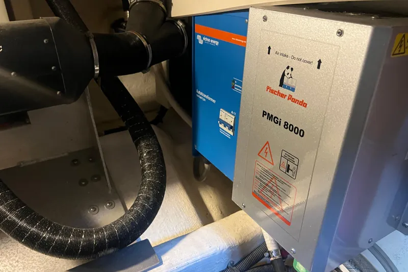  Yacht Photos Pics Engine room of 2005 Sabre Flybridge with Fischer Panda PMGi 8000 generator.