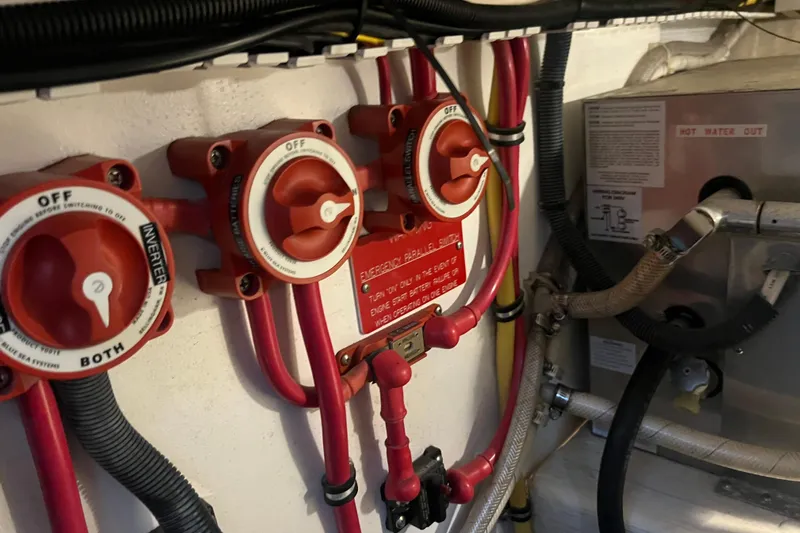  Yacht Photos Pics Electrical switches and wiring in a 2005 Sabre Flybridge boat engine room.