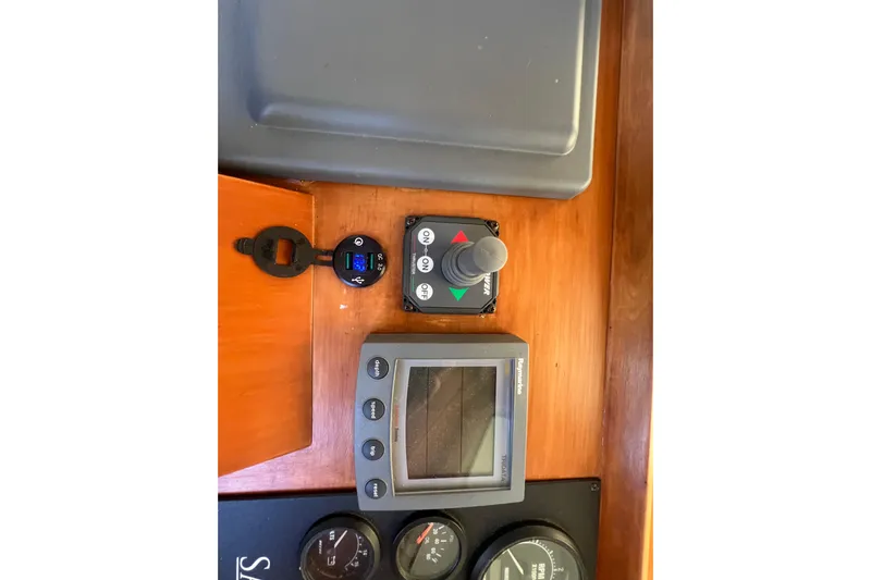  Yacht Photos Pics 2005 Sabre Flybridge control panel with joystick and display screen.