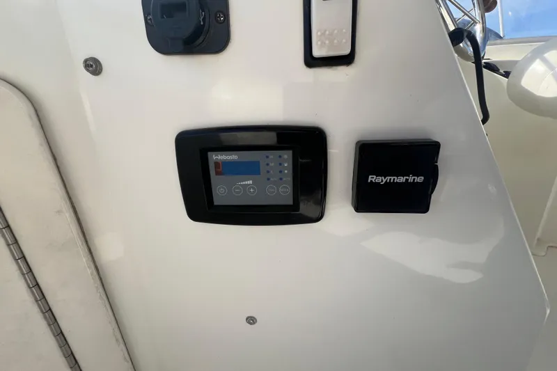  Yacht Photos Pics Control panel on 2005 Sabre Flybridge with Webasto and Raymarine displays.