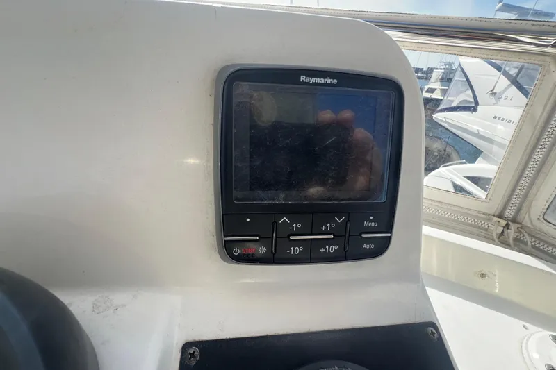  Yacht Photos Pics Raymarine navigation system on 2005 Sabre Flybridge yacht dashboard.
