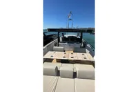 2008 Fjord 40' Open yacht with spacious deck and seating, docked on a sunny day.