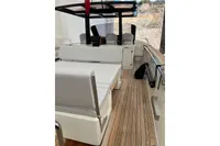 Luxurious 2008 Fjord 40' Open yacht interior with sleek seating and wooden deck.