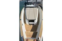 2008 Fjord 40' Open boat with sleek deck design and beige seating.