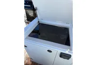 Open storage compartment on 2008 Fjord 40' Open yacht, featuring sleek design and modern finish.