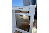 Stainless steel appliance on 2008 Fjord 40' Open yacht, featuring sleek design and wooden accents.