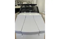 2008 Fjord 40' Open yacht with cushioned deck, sleek design, and modern windshield.