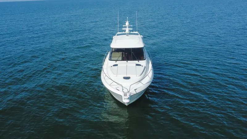 Dreamscape Yacht Photos Pics 2008 Tiara Yachts 5800 Sovran cruising on open water.