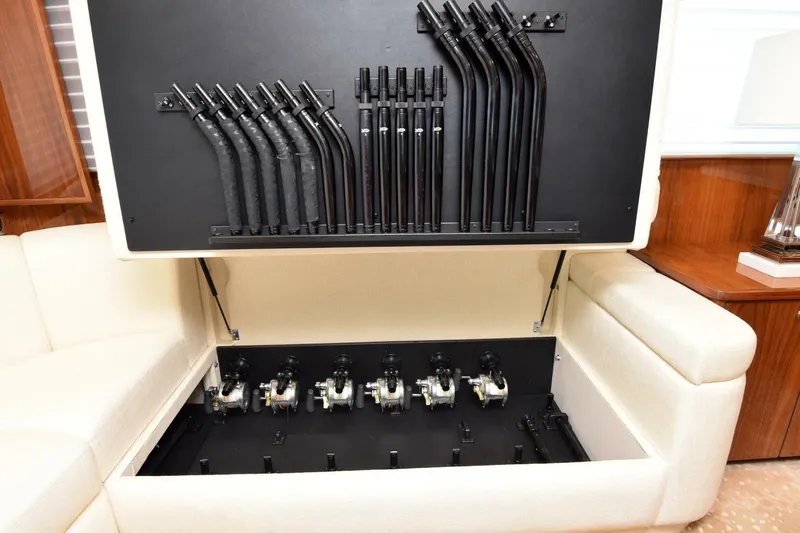  Yacht Photos Pics Hidden fishing rod storage in 2019 Viking 80 Skybridge yacht interior.