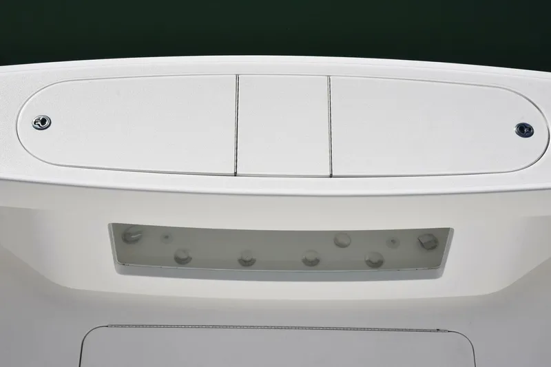  Yacht Photos Pics 2019 Viking 80 Skybridge yacht deck with storage compartments and sleek design.