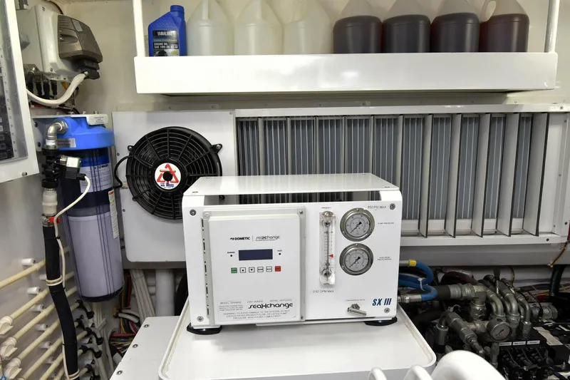  Yacht Photos Pics Engine room of 2019 Viking 80 Skybridge yacht with Dometic equipment and filtration system.