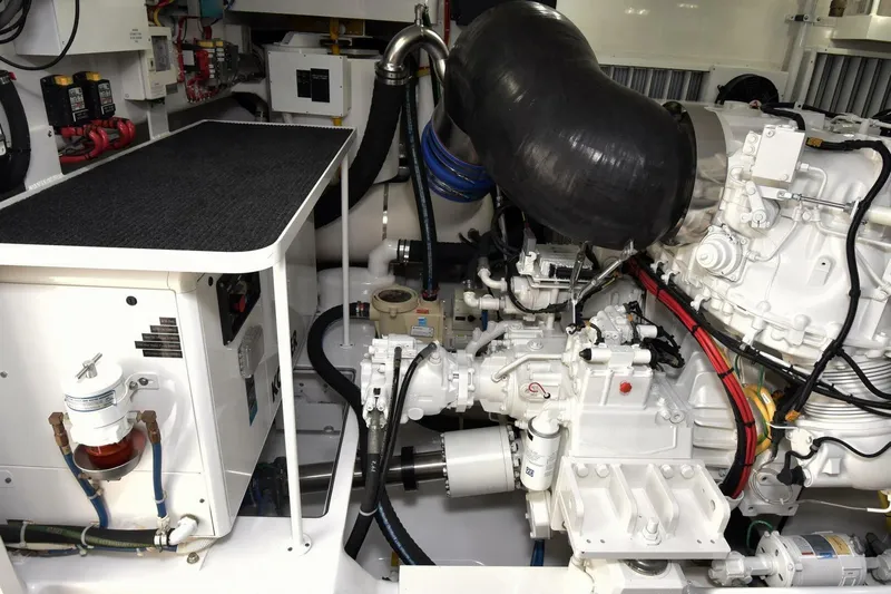  Yacht Photos Pics Engine room of 2019 Viking 80 Skybridge yacht, showcasing mechanical components and systems.
