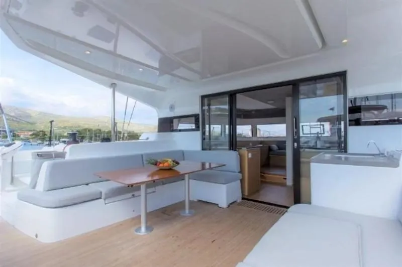 Tranquillity Yacht Photos Pics Luxurious 2022 Excess 15 yacht interior with spacious seating and dining area.