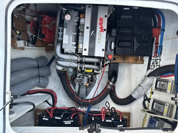 Tranquillity Yacht Photos Pics Engine compartment of a 2022 Excess 15 yacht with Yanmar engine and battery setup.