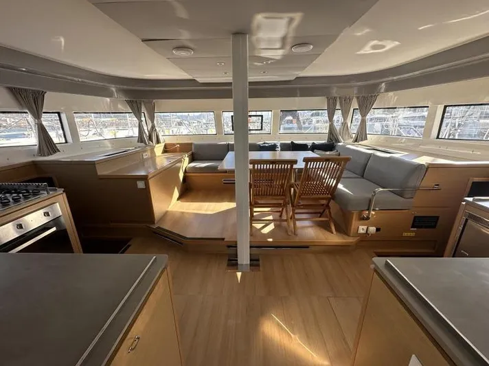 Tranquillity Yacht Photos Pics Luxurious interior of 2022 Excess 15 yacht with spacious seating and modern kitchen.