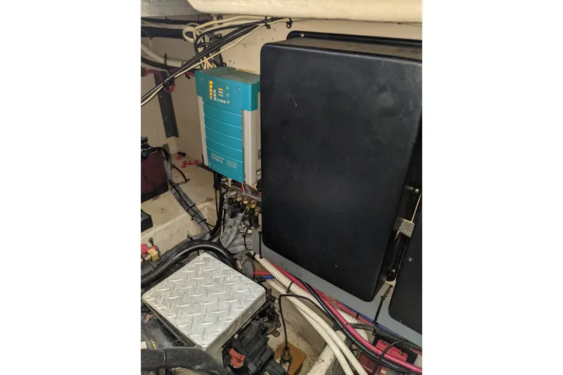 Lottie-da Yacht Photos Pics Engine room of 2004 Sea Ray 380 Sundancer with electrical components and wiring.