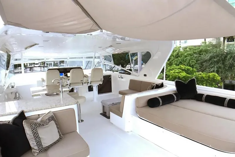 Harbor Lady Yacht Photos Pics Luxurious 2005 Pacific Mariner Raised Pilothouse Motor Yacht interior with elegant seating and helm.