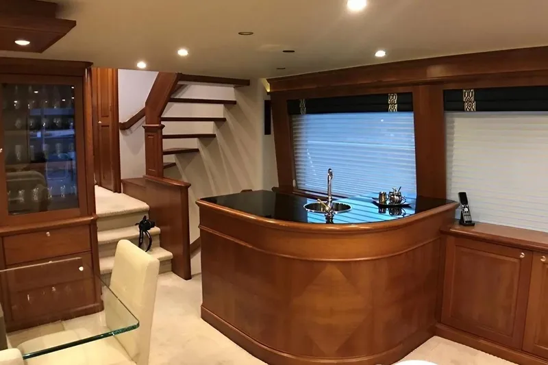 Harbor Lady Yacht Photos Pics Luxurious interior of 2005 Pacific Mariner Raised Pilothouse Motor Yacht with elegant wood finishes.