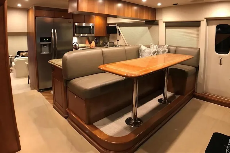 Harbor Lady Yacht Photos Pics Luxurious interior of a 2005 Pacific Mariner Raised Pilothouse Motor Yacht with dining area.