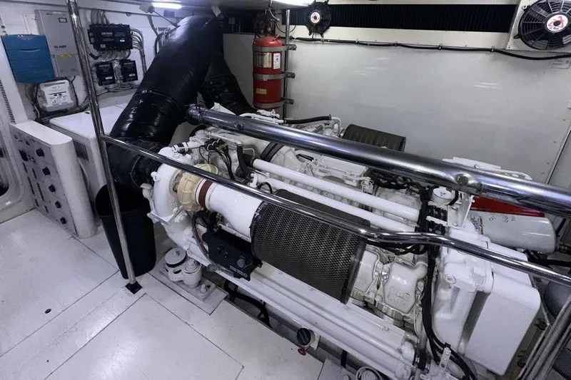 Harbor Lady Yacht Photos Pics Engine room of 2005 Pacific Mariner Raised Pilothouse Motoryacht with visible machinery and equipment.