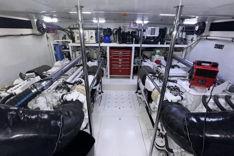 Harbor Lady Yacht Photos Pics Engine room of 2005 Pacific Mariner Raised Pilothouse Motoryacht with dual engines and equipment.