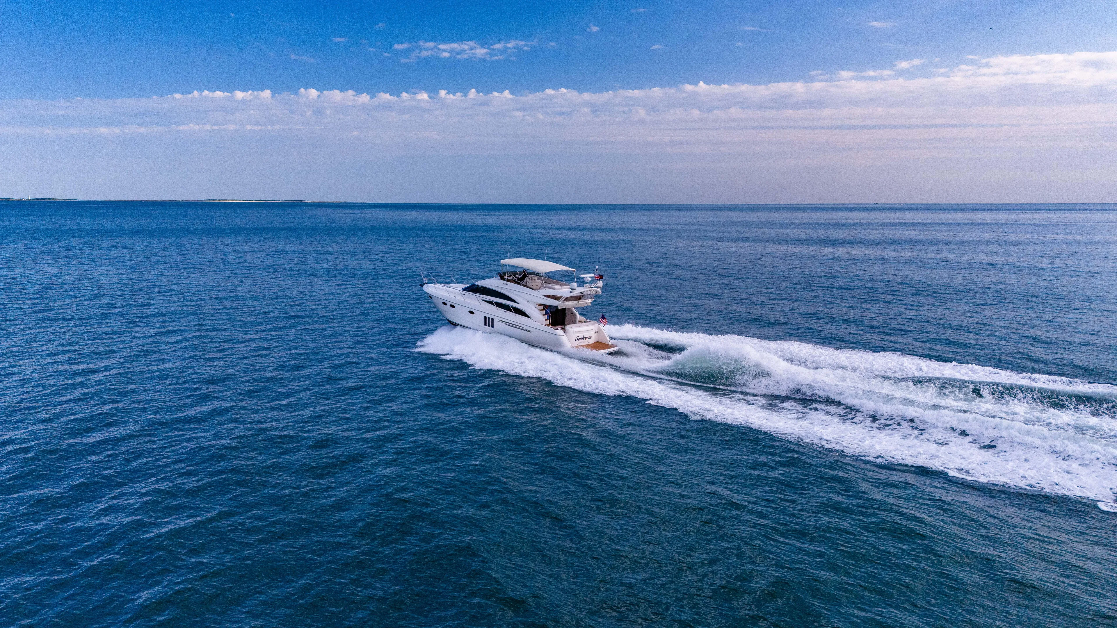 Seabreeze Yacht Photos Pics Princess 58 SEABREEZE - Port Aerial Running Shot