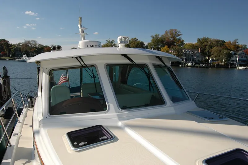 Serendipity Yacht Photos Pics 2019 Sabre 38 Salon Express yacht on calm water, showcasing sleek design and modern features.