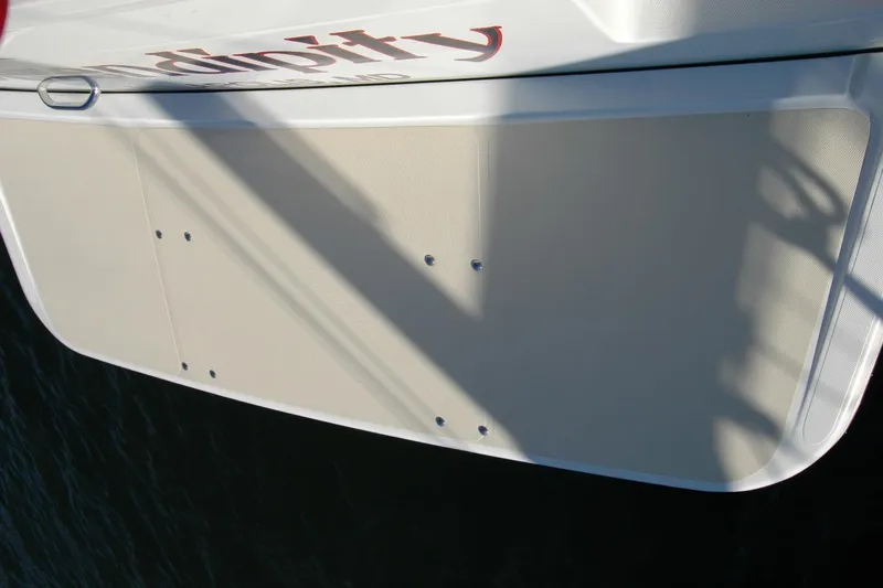 Serendipity Yacht Photos Pics 2019 Sabre 38 Salon Express boat stern platform with shadow and partial name visible.