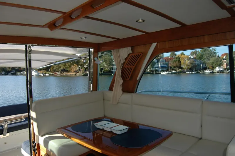Serendipity Yacht Photos Pics Interior of 2019 Sabre 38 Salon Express yacht with waterfront view.