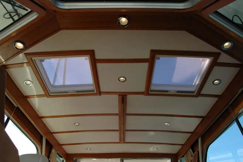 Serendipity Yacht Photos Pics Ceiling view of 2019 Sabre 38 Salon Express with skylights and recessed lighting.
