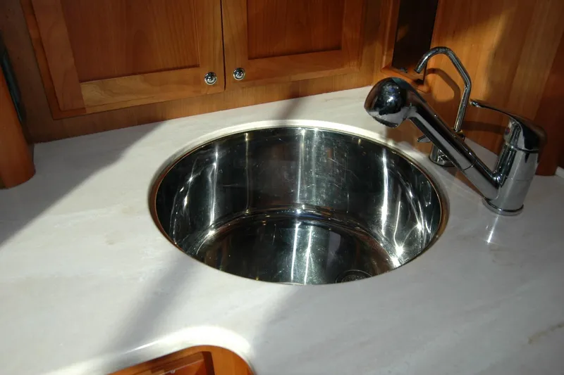 Serendipity Yacht Photos Pics Stainless steel sink and faucet in 2019 Sabre 38 Salon Express yacht kitchen.