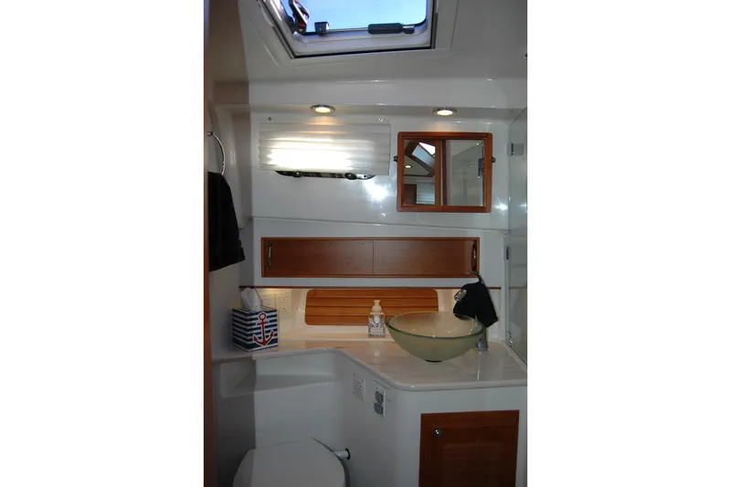 Serendipity Yacht Photos Pics Luxurious bathroom interior of 2019 Sabre 38 Salon Express yacht with modern fixtures.