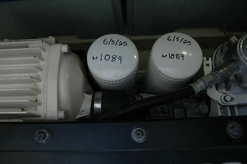 Serendipity Yacht Photos Pics Engine components of 2019 Sabre 38 Salon Express with labeled filters, showing maintenance details.