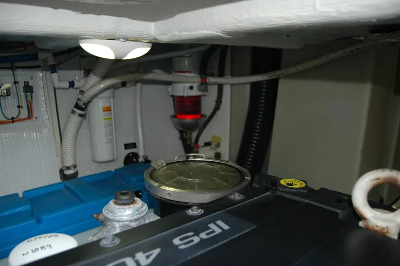 Serendipity Yacht Photos Pics Engine room of 2019 Sabre 38 Salon Express with visible components and wiring.