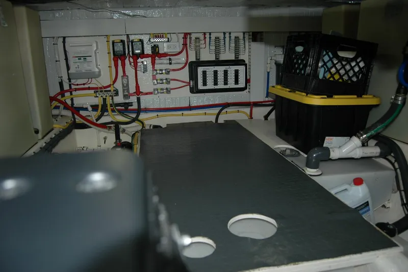 Serendipity Yacht Photos Pics Engine room of 2019 Sabre 38 Salon Express with wiring and storage crates.