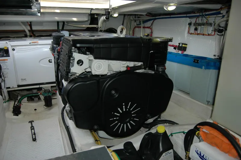 Serendipity Yacht Photos Pics Engine room of 2019 Sabre 38 Salon Express with visible machinery and equipment.
